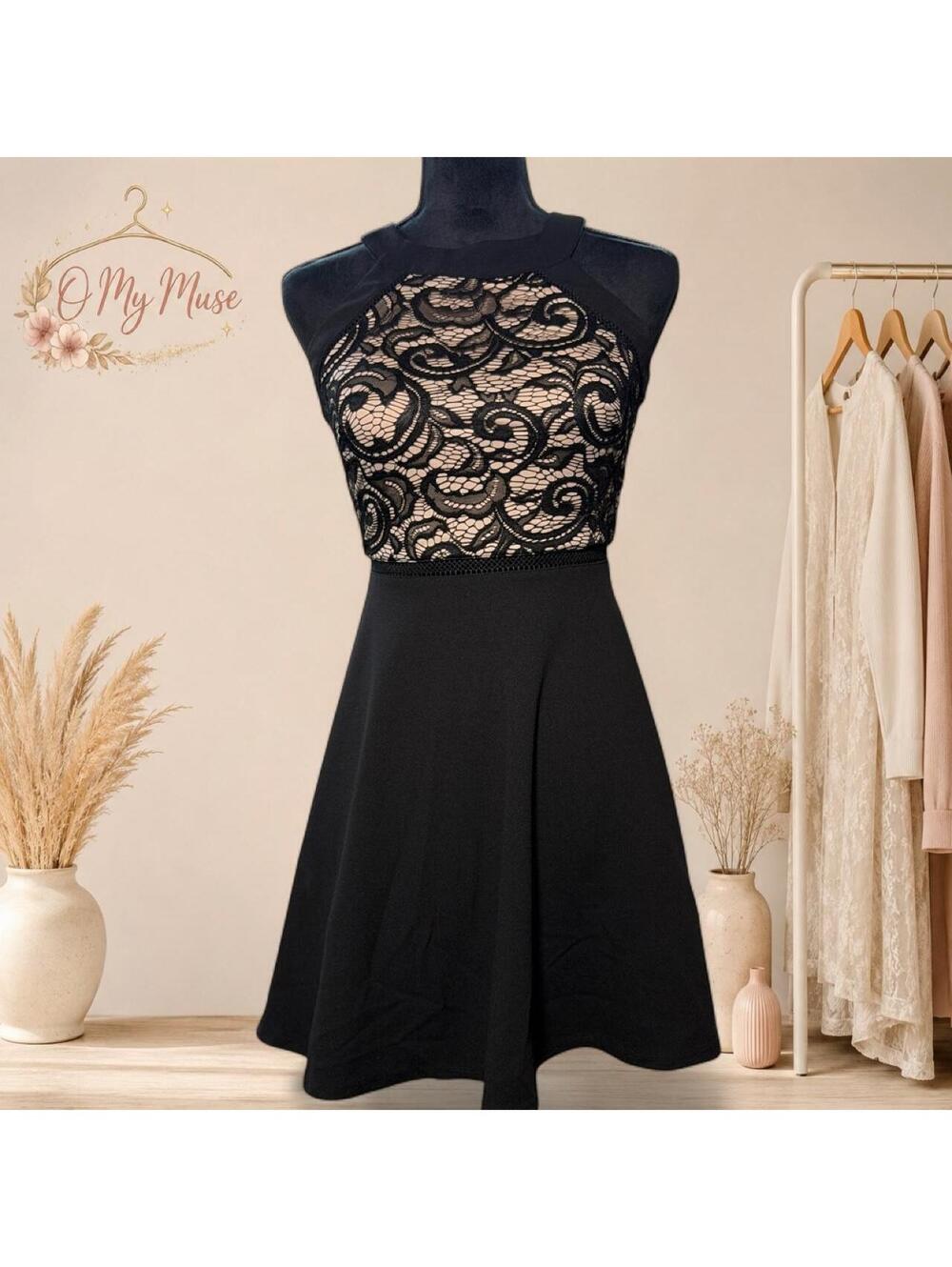 Black lace dress with swirling floral design